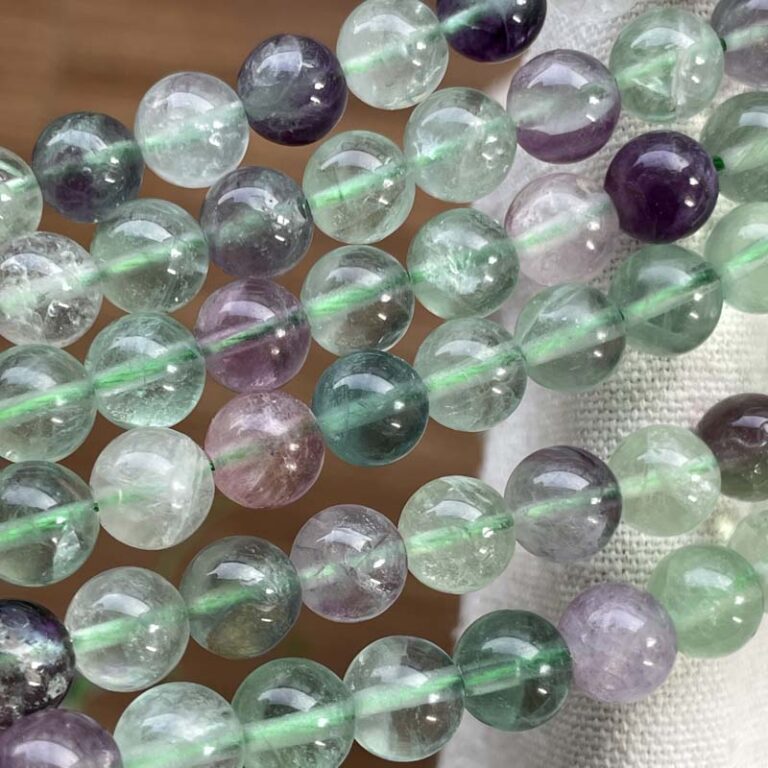 10956