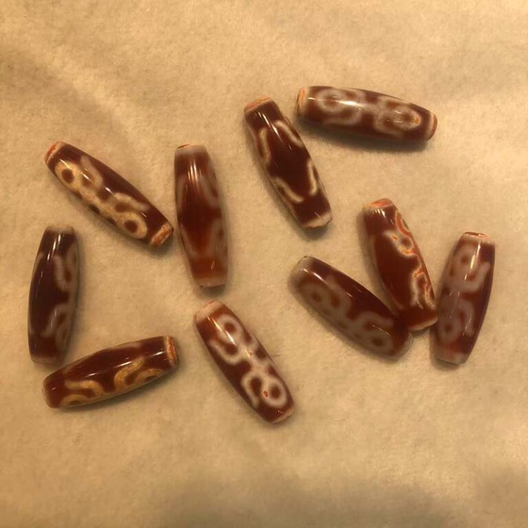 11016