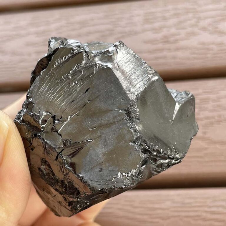 10975